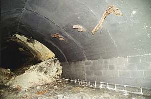One damaged tunnel of Kellerbau I with concreted roof on February 24, 2001 (Source: GMC publication "St. Georgen-Gusen-Mauthausen â Concentration Camp Mauthausen Reconsidered")